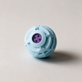 Slot 1 hero - The Rolly Ball on a plain warm-grey background